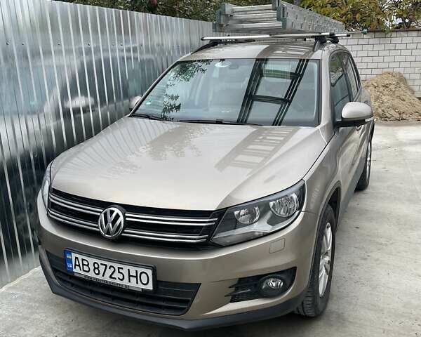 Коричневый Фольксваген Тигуан, объемом двигателя 1.98 л и пробегом 143 тыс. км за 13500 $, фото 1 на Automoto.ua