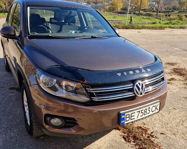 Коричневый Фольксваген Тигуан, объемом двигателя 1.97 л и пробегом 282 тыс. км за 12700 $, фото 1 на Automoto.ua