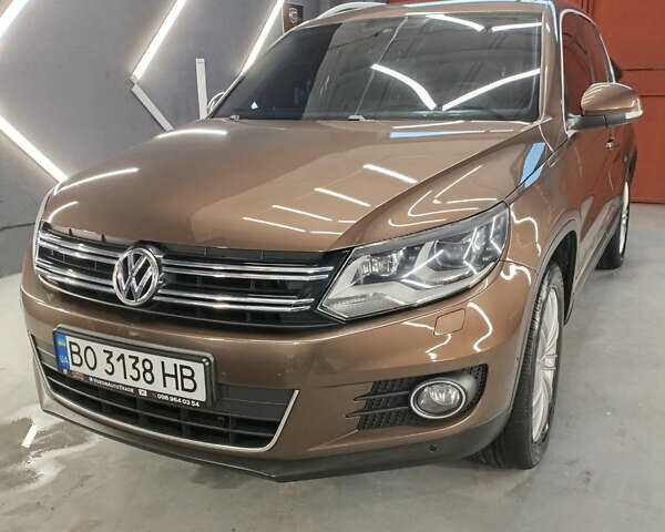 Коричневий Фольксваген Тігуан, об'ємом двигуна 2 л та пробігом 174 тис. км за 17700 $, фото 1 на Automoto.ua