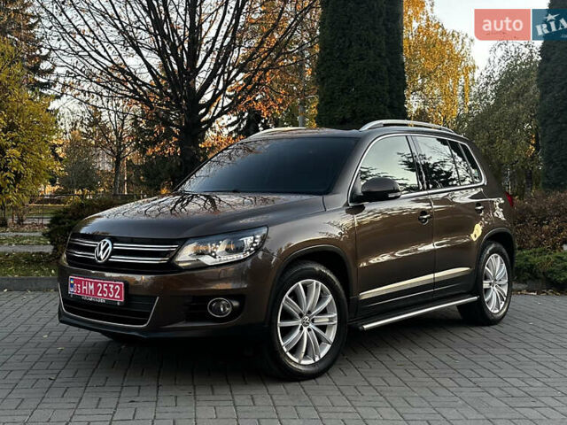 Коричневий Фольксваген Тігуан, об'ємом двигуна 2 л та пробігом 200 тис. км за 16650 $, фото 1 на Automoto.ua