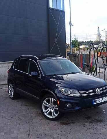 Червоний Фольксваген Тігуан, об'ємом двигуна 1.98 л та пробігом 182 тис. км за 12000 $, фото 1 на Automoto.ua