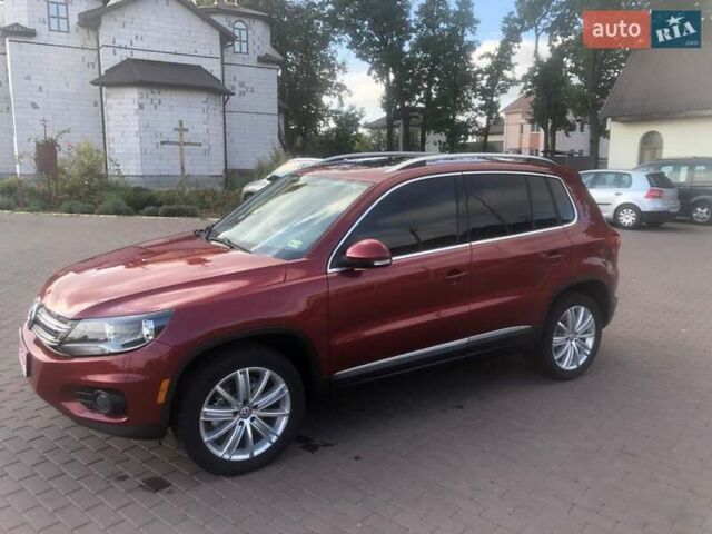 Красный Фольксваген Тигуан, объемом двигателя 2 л и пробегом 177 тыс. км за 12700 $, фото 1 на Automoto.ua