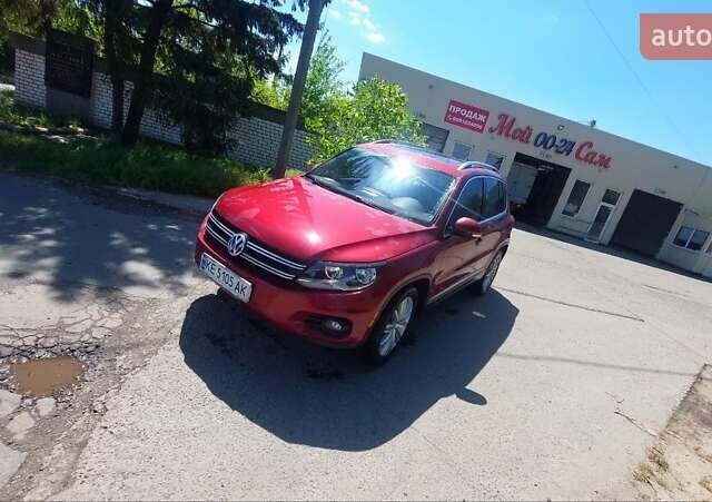 Красный Фольксваген Тигуан, объемом двигателя 1.98 л и пробегом 101 тыс. км за 15500 $, фото 1 на Automoto.ua
