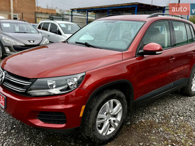 Червоний Фольксваген Тігуан, об'ємом двигуна 2 л та пробігом 140 тис. км за 11100 $, фото 1 на Automoto.ua