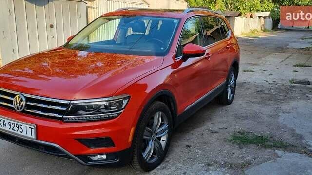 Красный Фольксваген Тигуан, объемом двигателя 1.98 л и пробегом 65 тыс. км за 23500 $, фото 1 на Automoto.ua