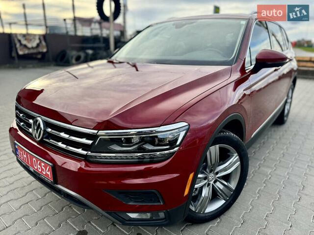 Красный Фольксваген Тигуан, объемом двигателя 2 л и пробегом 52 тыс. км за 22900 $, фото 1 на Automoto.ua