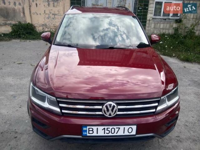 Красный Фольксваген Тигуан, объемом двигателя 1.98 л и пробегом 113 тыс. км за 16500 $, фото 1 на Automoto.ua