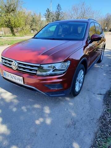Червоний Фольксваген Тігуан, об'ємом двигуна 1.98 л та пробігом 124 тис. км за 22500 $, фото 1 на Automoto.ua