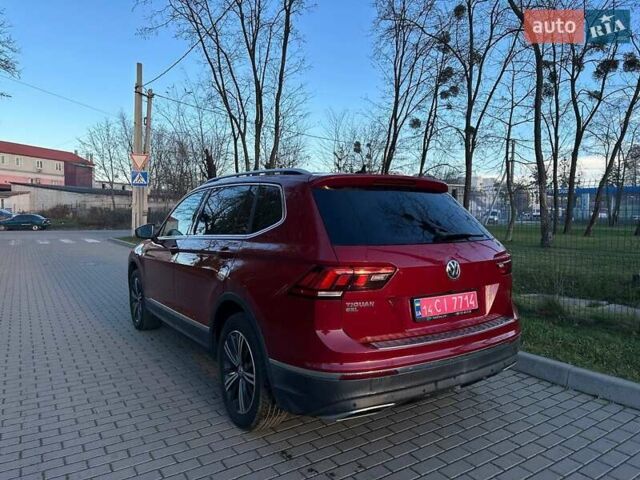 Красный Фольксваген Тигуан, объемом двигателя 2 л и пробегом 115 тыс. км за 20500 $, фото 1 на Automoto.ua