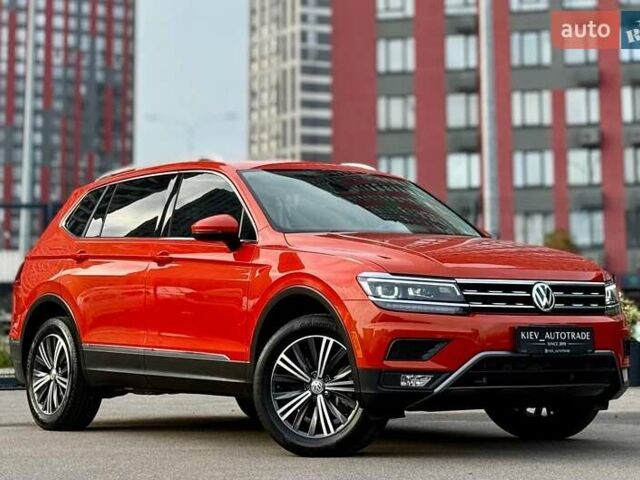 Красный Фольксваген Тигуан, объемом двигателя 2 л и пробегом 46 тыс. км за 22500 $, фото 1 на Automoto.ua