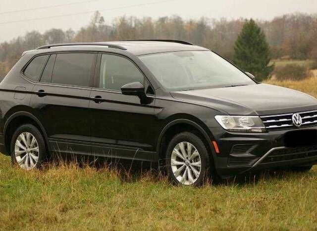 Красный Фольксваген Тигуан, объемом двигателя 2 л и пробегом 35 тыс. км за 13200 $, фото 1 на Automoto.ua