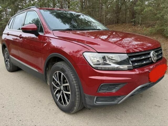 Красный Фольксваген Тигуан, объемом двигателя 0 л и пробегом 106 тыс. км за 14500 $, фото 1 на Automoto.ua