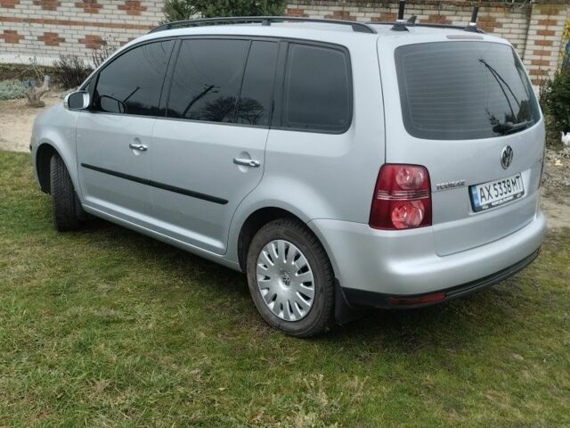 Серый Фольксваген Тигуан, объемом двигателя 1.9 л и пробегом 245 тыс. км за 8600 $, фото 1 на Automoto.ua