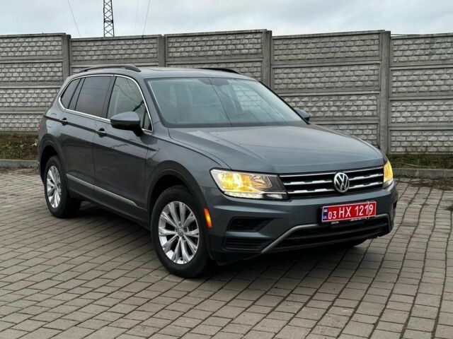 Серый Фольксваген Тигуан, объемом двигателя 2 л и пробегом 165 тыс. км за 16300 $, фото 1 на Automoto.ua