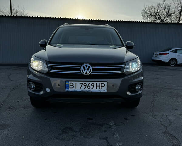 Сірий Фольксваген Тігуан, об'ємом двигуна 1.98 л та пробігом 268 тис. км за 10800 $, фото 1 на Automoto.ua