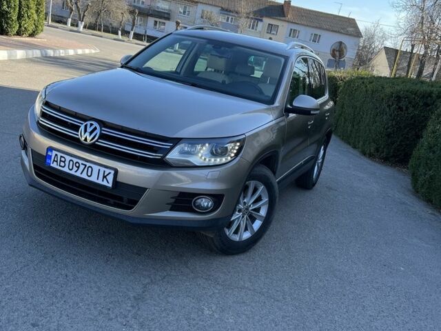 Сірий Фольксваген Тігуан, об'ємом двигуна 2 л та пробігом 245 тис. км за 17666 $, фото 1 на Automoto.ua