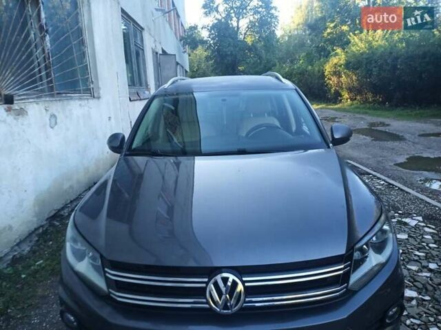 Сірий Фольксваген Тігуан, об'ємом двигуна 2 л та пробігом 150 тис. км за 11000 $, фото 1 на Automoto.ua