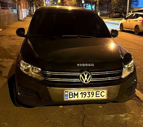 Сірий Фольксваген Тігуан, об'ємом двигуна 2 л та пробігом 196 тис. км за 12000 $, фото 1 на Automoto.ua