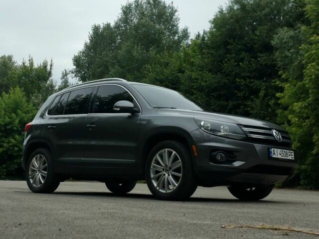 Сірий Фольксваген Тігуан, об'ємом двигуна 2 л та пробігом 205 тис. км за 12200 $, фото 1 на Automoto.ua