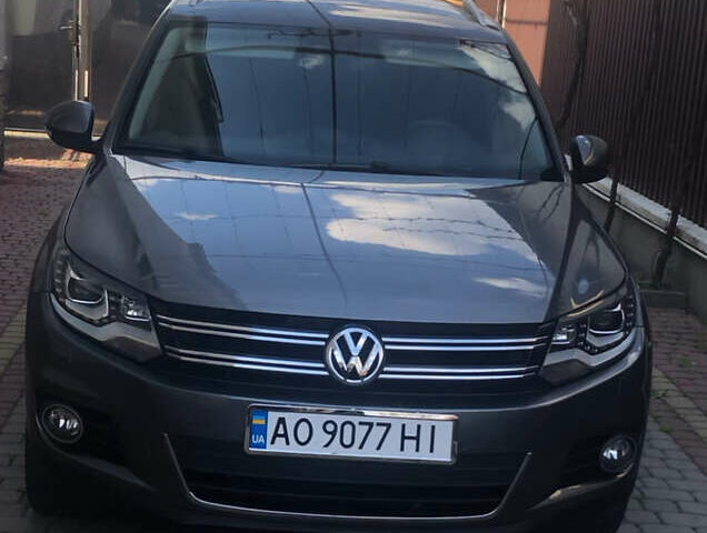Сірий Фольксваген Тігуан, об'ємом двигуна 2 л та пробігом 172 тис. км за 15000 $, фото 1 на Automoto.ua