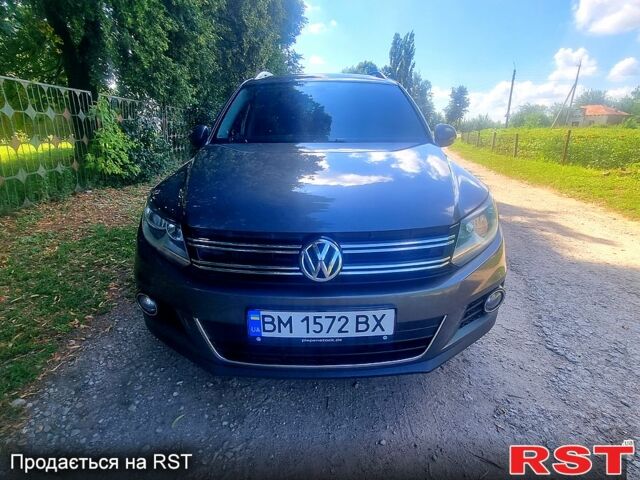 Серый Фольксваген Тигуан, объемом двигателя 2 л и пробегом 190 тыс. км за 14000 $, фото 1 на Automoto.ua