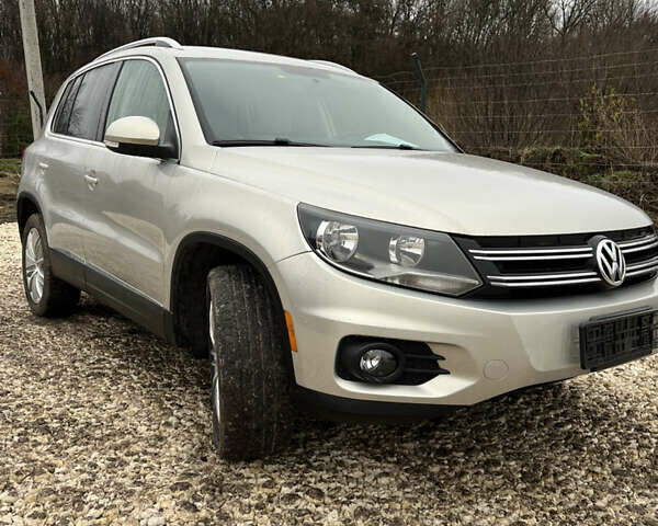 Серый Фольксваген Тигуан, объемом двигателя 2 л и пробегом 165 тыс. км за 10999 $, фото 1 на Automoto.ua