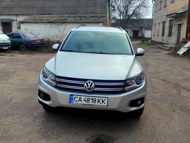 Сірий Фольксваген Тігуан, об'ємом двигуна 2 л та пробігом 148 тис. км за 14200 $, фото 1 на Automoto.ua