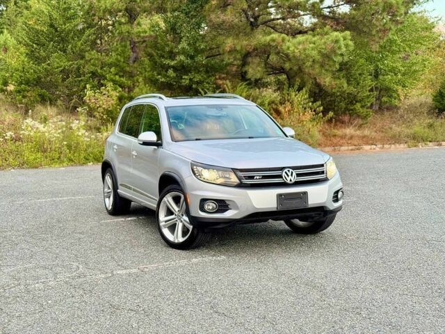 Серый Фольксваген Тигуан, объемом двигателя 2 л и пробегом 77 тыс. км за 9000 $, фото 1 на Automoto.ua