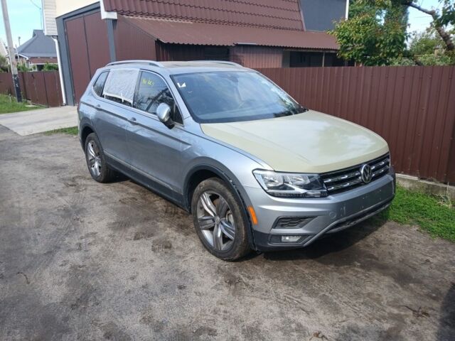 Сірий Фольксваген Тігуан, об'ємом двигуна 1.8 л та пробігом 128 тис. км за 11500 $, фото 1 на Automoto.ua