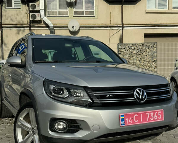 Сірий Фольксваген Тігуан, об'ємом двигуна 2 л та пробігом 175 тис. км за 12750 $, фото 1 на Automoto.ua
