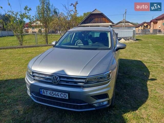 Серый Фольксваген Тигуан, объемом двигателя 1.98 л и пробегом 231 тыс. км за 23000 $, фото 1 на Automoto.ua