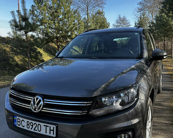 Сірий Фольксваген Тігуан, об'ємом двигуна 2 л та пробігом 108 тис. км за 14000 $, фото 1 на Automoto.ua