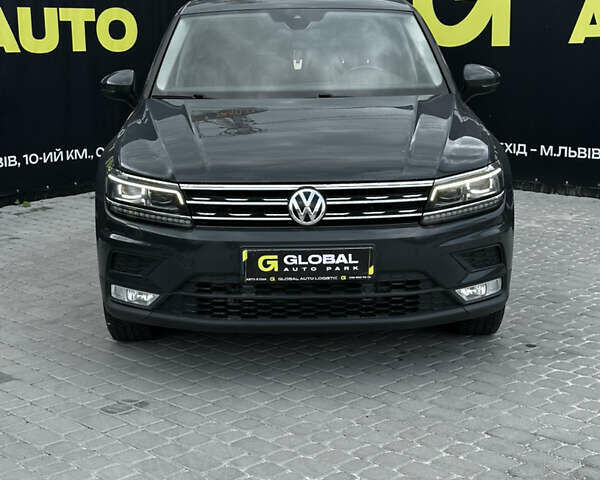 Сірий Фольксваген Тігуан, об'ємом двигуна 1.97 л та пробігом 181 тис. км за 22300 $, фото 1 на Automoto.ua