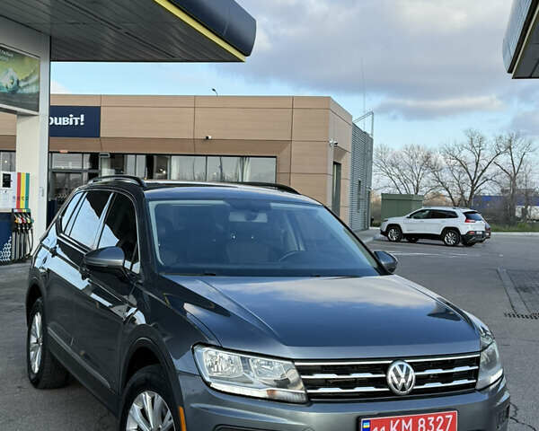 Серый Фольксваген Тигуан, объемом двигателя 2 л и пробегом 240 тыс. км за 14999 $, фото 1 на Automoto.ua