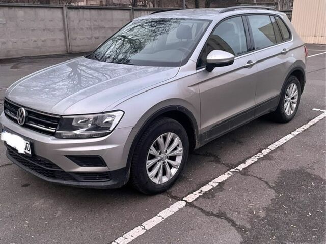 Сірий Фольксваген Тігуан, об'ємом двигуна 2 л та пробігом 250 тис. км за 15900 $, фото 1 на Automoto.ua
