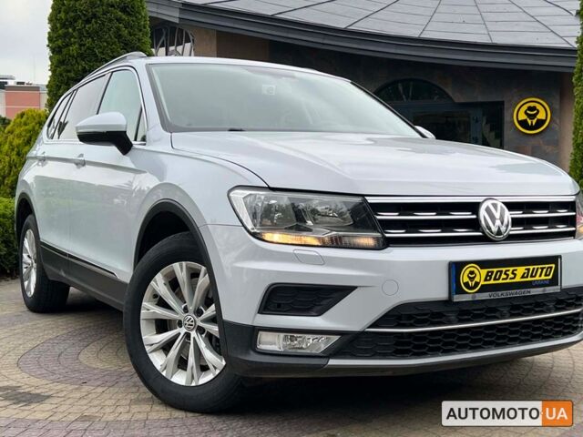 Сірий Фольксваген Тігуан, об'ємом двигуна 2 л та пробігом 60 тис. км за 24699 $, фото 1 на Automoto.ua