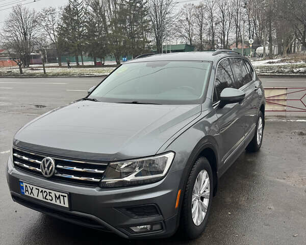 Серый Фольксваген Тигуан, объемом двигателя 1.98 л и пробегом 128 тыс. км за 17500 $, фото 1 на Automoto.ua