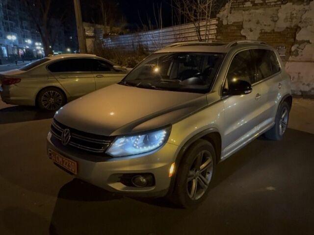 Серый Фольксваген Тигуан, объемом двигателя 2 л и пробегом 188 тыс. км за 336 $, фото 1 на Automoto.ua