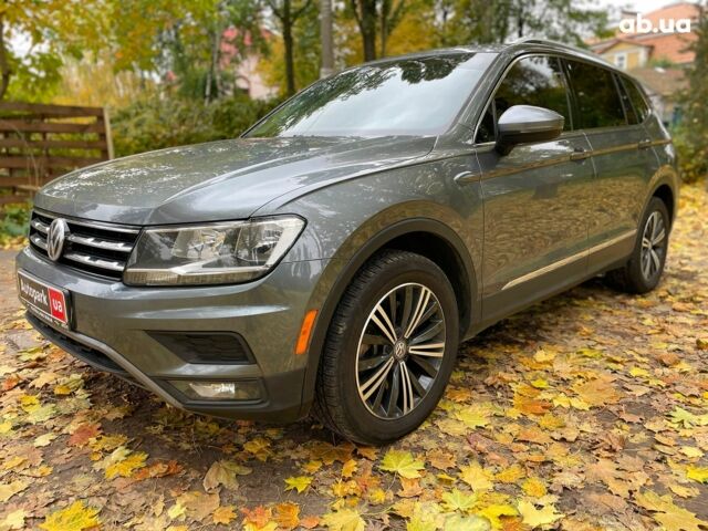 Серый Фольксваген Тигуан, объемом двигателя 2 л и пробегом 205 тыс. км за 16940 $, фото 1 на Automoto.ua