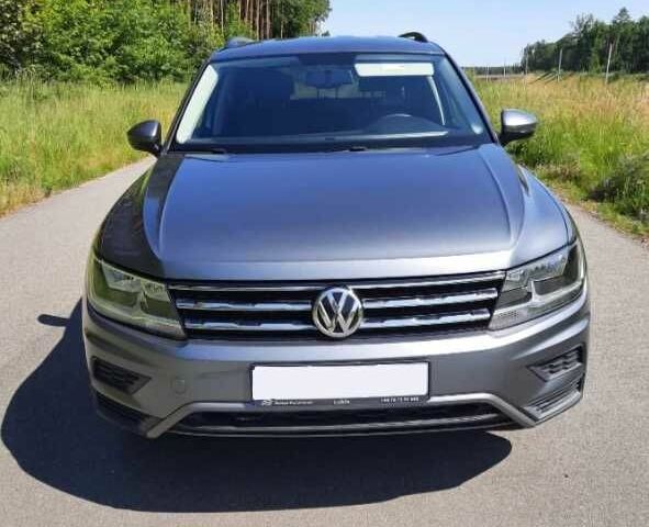 Сірий Фольксваген Тігуан, об'ємом двигуна 2 л та пробігом 105 тис. км за 11000 $, фото 1 на Automoto.ua