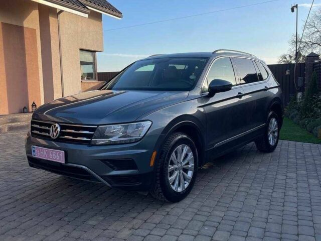 Серый Фольксваген Тигуан, объемом двигателя 2 л и пробегом 165 тыс. км за 16700 $, фото 1 на Automoto.ua