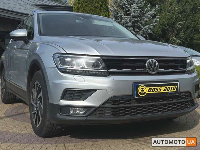 Серый Фольксваген Тигуан, объемом двигателя 2 л и пробегом 228 тыс. км за 24650 $, фото 1 на Automoto.ua