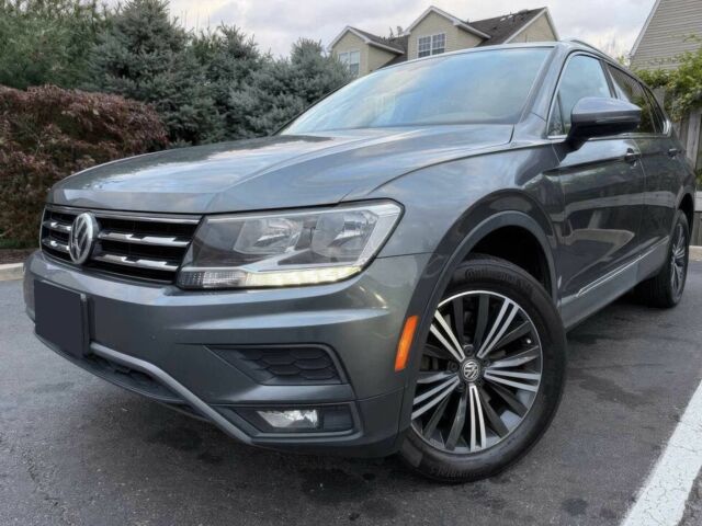 Серый Фольксваген Тигуан, объемом двигателя 2 л и пробегом 43 тыс. км за 5900 $, фото 1 на Automoto.ua