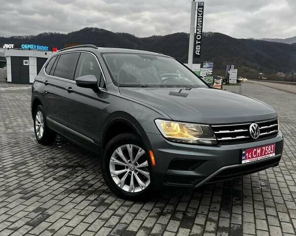 Сірий Фольксваген Тігуан, об'ємом двигуна 1.98 л та пробігом 240 тис. км за 15000 $, фото 1 на Automoto.ua