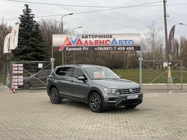 Серый Фольксваген Тигуан, объемом двигателя 2 л и пробегом 210 тыс. км за 14999 $, фото 1 на Automoto.ua