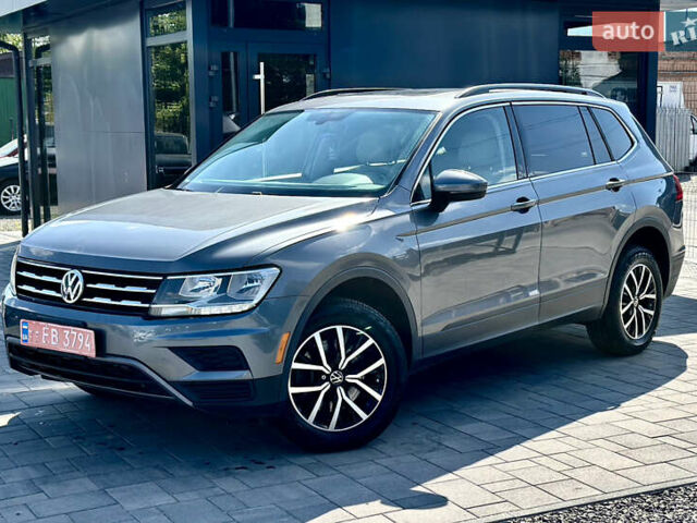 Сірий Фольксваген Тігуан, об'ємом двигуна 2 л та пробігом 122 тис. км за 17488 $, фото 1 на Automoto.ua