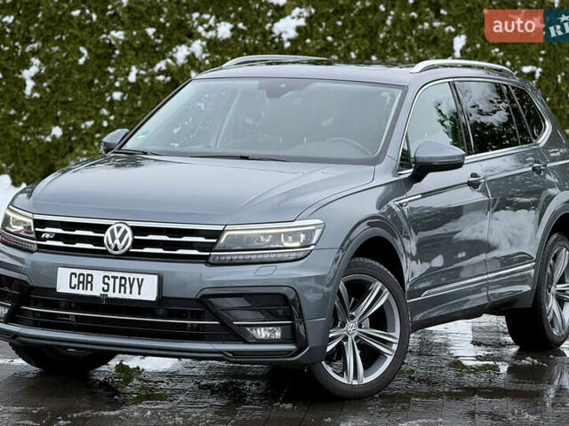 Серый Фольксваген Тигуан, объемом двигателя 2 л и пробегом 241 тыс. км за 26999 $, фото 1 на Automoto.ua