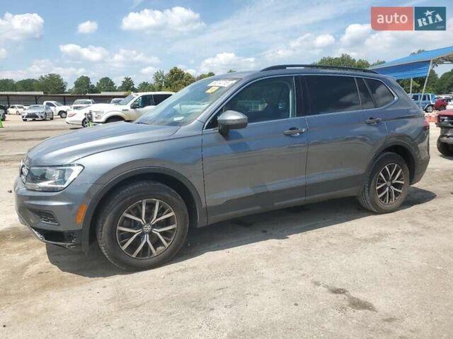 Серый Фольксваген Тигуан, объемом двигателя 2 л и пробегом 104 тыс. км за 4200 $, фото 1 на Automoto.ua