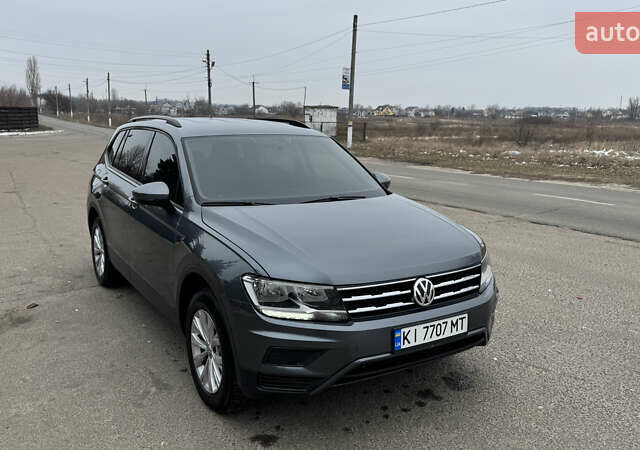 Сірий Фольксваген Тігуан, об'ємом двигуна 1.98 л та пробігом 257 тис. км за 16700 $, фото 1 на Automoto.ua