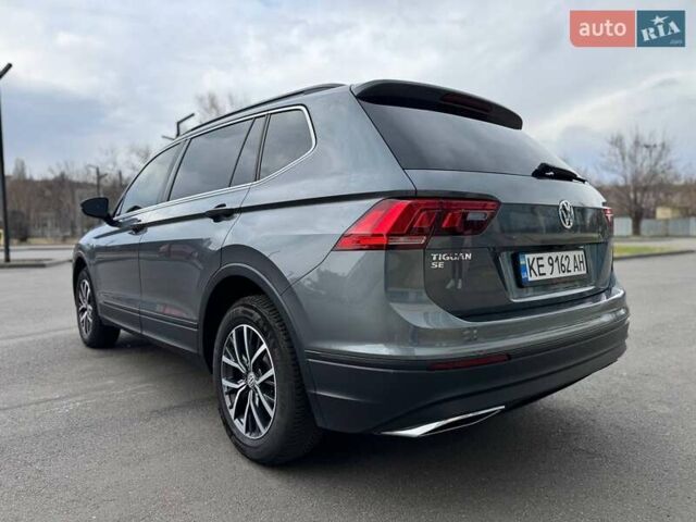 Сірий Фольксваген Тігуан, об'ємом двигуна 1.98 л та пробігом 112 тис. км за 22000 $, фото 1 на Automoto.ua